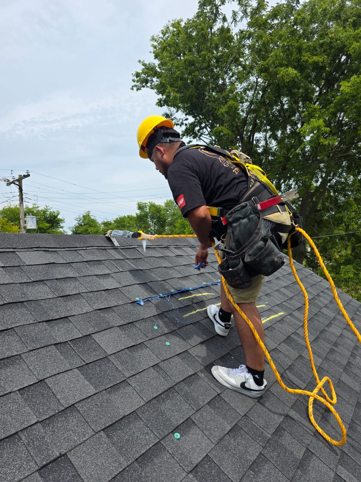 Golden Restoration team inspecting a roof