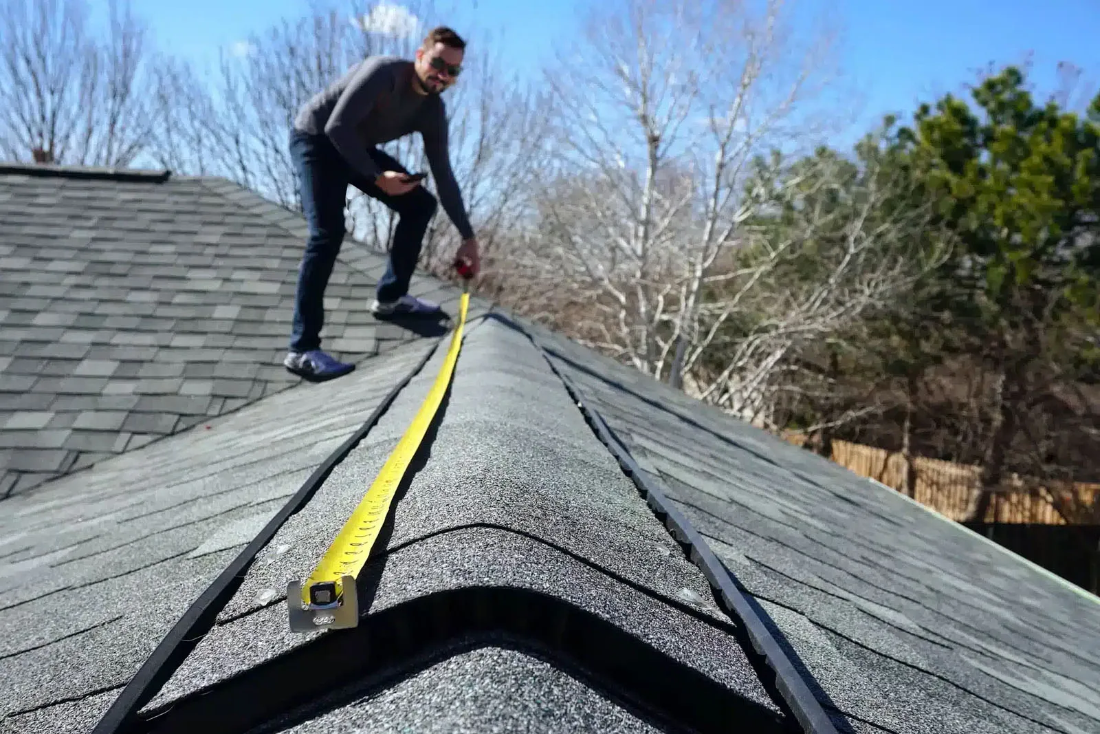 Homeowner reviewing roof inspection report